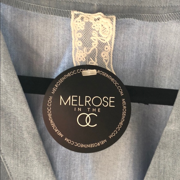 Brand new, short sleeve tie bottom v neck top. - Picture 2 of 4